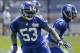 New York Giants inside linebacker Jameel McClain (53) moves back on defense during drills at NFL football minicamp, Wednesday, June 18, 2014, in East Rutherford, N.J. (AP Photo/Julie Jacobson)