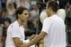 Lukas Rosol, right, of the Czech Republic is congratulated by Rafael Nadal of Spain after Rosol defeated Nadal in a second round men's singles match at the All England Lawn Tennis Championships at Wimbledon, England, Thursday, June 28, 2012. (AP Photo/Anja Niedringhaus)