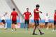 German national soccer team head coach Joachim Loew checks the time during an official training session the day before the group G World Cup soccer match between Germany and Ghana at the Arena Castelao in Fortaleza, Brazil, Friday, June 20, 2014. (AP Photo/Matthias Schrader)