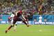 Portugal's Cristiano Ronaldo takes a shot during the group G World Cup soccer match between the United States and Portugal at the Arena da Amazonia in Manaus, Brazil, Sunday, June 22, 2014. (AP Photo/Marcio Jose Sanchez)