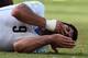 NATAL, BRAZIL - JUNE 24: Luis Suarez of Uruguay reacts after a clash during the 2014 FIFA World Cup Brazil Group D match between Italy and Uruguay at Estadio das Dunas on June 24, 2014 in Natal, Brazil. (Photo by Matthias Hangst/Getty Images)