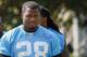 Carolina Panthers running back Jonathan Stewart walks to the practice field before an NFL football practice Wednesday, June 18, 2014 in Charlotte, N.C. (AP Photo/Nell Redmond)
