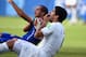 NATAL, BRAZIL - JUNE 24: Luis Suarez of Uruguay and Giorgio Chiellini of Italy react after a clash during the 2014 FIFA World Cup Brazil Group D match between Italy and Uruguay at Estadio das Dunas on June 24, 2014 in Natal, Brazil. (Photo by Matthias Hangst/Getty Images)