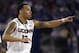 Apr 7, 2014; Arlington, TX, USA; Connecticut Huskies guard Shabazz Napier (13) reacts against the Kentucky Wildcats during the championship game of the Final Four in the 2014 NCAA Mens Division I Championship tournament at AT&T Stadium. Mandatory Credit: Robert Deutsch-USA TODAY Sports