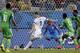 Bosnia's Edin Dzeko takes a shot on Nigeria's goalkeeper Vincent Enyeama in the closing seconds of the group F World Cup soccer match between Nigeria and Bosnia at the Arena Pantanal in Cuiaba, Brazil, Saturday, June 21, 2014. (AP Photo/Felipe Dana)