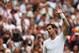 LONDON, ENGLAND - JUNE 23: Andy Murray of Great Britain acknowledgese the fans after winning his Gentlemen's Singles first round match against David Goffin of Belgium on day one of the Wimbledon Lawn Tennis Championships at the All England Lawn Tennis and Croquet Club at Wimbledon on June 23, 2014 in London, England. (Photo by Matthew Stockman/Getty Images)