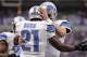 MINNEAPOLIS, MN - DECEMBER 29: Reggie Bush #21 and Matthew Stafford #9 of the Detroit Lions celebrate a touchdown against the Minnesota Vikings during the third quarter of the game on December 29, 2013 at Mall of America Field at the Hubert H. Humphrey Metrodome in Minneapolis, Minnesota. The Vikings defeated the Lions 14-13. (Photo by Hannah Foslien/Getty Images)