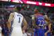 Duke forward Jabari Parker (1) and Kansas guard Andrew Wiggins (22) wait for a free throw during the second half of an NCAA college basketball game Tuesday, Nov. 12, 2013, in Chicago. Kansas won 94-83. (AP Photo/Charles Rex Arbogast)