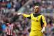 Liverpool's goalkeeper Pepe Reina, is seen reacting during their English Premier League soccer match against Sunderland at the Stadium of Light, Sunderland, England, Saturday, Sept. 15, 2012. (AP Photo/Scott Heppell)