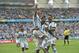 Argentina's Lionel Messi, left, is carried by his teammates Argentina's Angel di Maria (7) and Argentina's Marcos Rojo after scoring his side's first goal during the group F World Cup soccer match between Nigeria and Argentina at the Estadio Beira-Rio in Porto Alegre, Brazil, Wednesday, June 25, 2014. (AP Photo/Martin Meissner)
