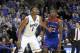 Duke forward Jabari Parker and Kansas guard Andrew Wiggins look for a possible rebound off a free-throw attempt during the second half of an NCAA college basketball game Tuesday, Nov. 12, 2013, in Chicago. Kansas won 94-83. (AP Photo/Charles Rex Arbogast)