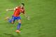 Chile's Alexis Sanchez celebrates after scoring during the group B World Cup soccer match between Chile and Australia in the Arena Pantanal in Cuiaba, Brazil, Friday, June 13, 2014. (AP Photo/Michael Sohn)