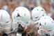 Apr 19, 2014; Austin, TX, USA; The Texas Longhorns raise their helmets prior to the Spring Game at Texas Memorial Stadium. Mandatory Credit: Brendan Maloney-USA TODAY Sports