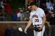 Virginia's Nick Howard prepares to pitch during the ninth inning of an NCAA college baseball regional tournament game against Arkansas in Charlottesville, Va., Saturday, May 31, 2014. (AP Photo/Pat Jarrett)