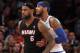 Jan 9, 2014; New York, NY, USA; New York Knicks small forward Carmelo Anthony (7) defends Miami Heat small forward LeBron James (6) during the fourth quarter of a game at Madison Square Garden. Mandatory Credit: Brad Penner-USA TODAY Sports