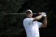 Tiger Woods watches his tee shot on the fifth tee during the opening ceremony Pro-Am at the Quicken Loans National golf tournament, Wednesday, June 25, 2014, in Bethesda, Md. (AP Photo/Nick Wass)