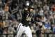 Vanderbilt's John Norwood celebrates as he runs the bases after hitting a home run against Virginia in the eighth inning of Game 3 of the best-of-three NCAA baseball College World Series finals in Omaha, Neb., Wednesday, June 25, 2014. (AP Photo/Eric Francis)