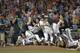 Vanderbilt players celebrate a 3-2 win over Virginia in the deciding game of the best-of-three NCAA baseball College World Series finals in Omaha, Neb., Wednesday, June 25, 2014. (AP Photo/Ted Kirk)