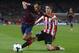 FC Barcelona's Alexis Sanchez, from Chile, left, duels for the ball against Athletic Bilbao's Ander Herrera during a Spanish La Liga soccer match at the Camp Nou stadium in Barcelona, Spain, Sunday April 20, 2014. (AP Photo/Manu Fernandez)