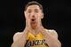 Los Angeles Lakers' Steve Nash communicates with teammate Pau Gasol, not pictured, against the Portland Trail Blazers during the first half of an NBA basketball game in Los Angeles, Tuesday, April 1, 2014. (AP Photo/Danny Moloshok)
