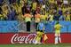Brazil's Neymar celebrates with Dani Alves (2) after scoring his side's second goal during the group A World Cup soccer match between Cameroon and Brazil at the Estadio Nacional in Brasilia, Brazil, Monday, June 23, 2014. (AP Photo/Natacha Pisarenko)