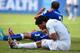 NATAL, BRAZIL - JUNE 24: Luis Suarez of Uruguay and Giorgio Chiellini of Italy react after a clash during the 2014 FIFA World Cup Brazil Group D match between Italy and Uruguay at Estadio das Dunas on June 24, 2014 in Natal, Brazil. (Photo by Matthias Hangst/Getty Images)