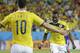 Colombia's Jackson Martinez, right, celebrates with teammate Colombia's James Rodriguez after scoring his teams third goal during the group C World Cup soccer match between Japan and Colombia at the Arena Pantanal in Cuiaba, Brazil, Tuesday, June 24, 2014. (AP Photo/Felipe Dana)