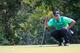 BETHESDA, MD - JUNE 26: Tiger Woods of the United States studies his putt on the 16th hole during the first round of the Quicken Loans National at Congressional Country Club on June 26, 2014 in Bethesda, Maryland. (Photo by Rob Carr/Getty Images)