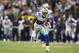 ARLINGTON, TX - DECEMBER 29: Dez Bryant #88 of the Dallas Cowboys carries a pass for a fourth quarter touchdown against the Philadelphia Eagles at Cowboys Stadium on December 29, 2013 in Arlington, Texas. (Photo by Ronald Martinez/Getty Images)