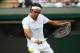 LONDON, ENGLAND - JUNE 24: Roger Federer of Switzerland in action during his Gentlemen's Singles first round match against Paolo Lorenzi of Italy on day two of the Wimbledon Lawn Tennis Championships at the All England Lawn Tennis and Croquet Club at Wimbledon on June 24, 2014 in London, England. (Photo by Jan Kruger/Getty Images)