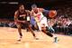 NEW YORK, NY - JANUARY 9: Carmelo Anthony #7 of the New York Knicks drives against LeBron James #6 of the Miami Heat during a game at Madison Square Garden in New York City on January 9, 2014. NOTE TO USER: User expressly acknowledges and agrees that, by downloading and or using this photograph, User is consenting to the terms and conditions of the Getty Images License Agreement. Mandatory Copyright Notice: Copyright 2014 NBAE (Photo by Nathaniel S. Butler/NBAE via Getty Images)
