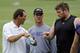 Baltimore Ravens owner Steve Bisciotti, from left, head coach John Harbaugh and guard Marshal Yanda chat after an NFL football practice, Thursday, June 19, 2014, at the team's practice facility in Owings Mills, Md. (AP Photo/Patrick Semansky)