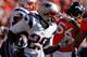 DENVER, CO - JANUARY 19: LeGarrette Blount #29 of the New England Patriots runs the ball against the Denver Broncos during the AFC Championship game at Sports Authority Field at Mile High on January 19, 2014 in Denver, Colorado. (Photo by Kevin C. Cox/Getty Images)