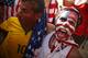 RIO DE JANEIRO, BRAZIL - JUNE 26: A U.S. supporter and a Brazil supporter celebrate the U.S. advancing to the Round of 16 after their loss to Germany while watching the match at FIFA Fan Fest on June 26, 2014 in Rio de Janeiro, Brazil. The U.S. lost 1-0 but still advance to the knockout stage of the 2014 FIFA World Cup based on goal differential. (Photo by Mario Tama/Getty Images)