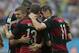 Germany's Miroslav Klose, right, congratulates Thomas Mueller after he scored the opening goal during the group G World Cup soccer match between the USA and Germany at the Arena Pernambuco in Recife, Brazil, Thursday, June 26, 2014. (AP Photo/Petr David Josek)