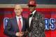 NBA Commissioner Adam Silver, left, congratulates Andrew Wiggins of Kansas who was selected by the Cleveland Cavaliers as the number one pick in the 2014 NBA draft, Thursday, June 26, 2014, in New York. (AP Photo/Jason DeCrow)