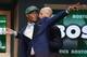 Oklahoma State's Marcus Smart, left, points to fans after being selected sixth overall by the Boston Celtics during the 2014 NBA draft, Thursday, June 26, 2014, in New York. (AP Photo/Jason DeCrow)