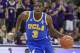 UCLA's Jordan Adams dribbles the ball in first half of an NCAA college basketball game against Washington, Thursday March 6, 2014, in Seattle. UCLA defeated Washington 91-82. (AP Photo/Stephen Brashear)
