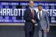 Connecticut's Shabazz Napier, right, poses for photos with NBA commissioner Adam Silver after being selected as the 24th overall pick by the Charlotte Hornets during the 2014 NBA draft, Thursday, June 26, 2014, in New York. (AP Photo/Kathy Willens)