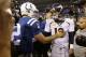 Denver Broncos quarterback Peyton Manning, right, greets Indianapolis Colts quarterback Andrew Luck (12) after an NFL football game, Sunday, Oct. 20, 2013, in Indianapolis. The Colts won 39-33. (AP Photo/Michael Conroy)