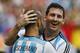 Argentina's Lionel Messi, right, hugs his teammate Javier Mascherano after scoring his side's second goal during the group F World Cup soccer match against Nigeria at the Estadio Beira-Rio in Porto Alegre, Brazil, Wednesday, June 25, 2014. (AP Photo/Jon Super)