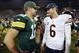 Green Bay Packers' Aaron Rodgers (12) talks to Chicago Bears' Jay Cutler (6) after the second half of an NFL football game Thursday, Sept. 13, 2012, in Green Bay, Wis. The Packers won 23-10. (AP Photo/Mike Roemer)