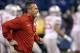 Ohio State head coach Urban Meyer runs onto the field before the Big Ten Conference championship NCAA college football game against Michigan State, Saturday, Dec. 7, 2013, in Indianapolis. (AP Photo/AJ Mast)