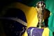 PORTO SEGURO, BRAZIL - JUNE 12: A replica of the FIFA world cup trophy is displayed during the Group A match between Brazil and Croatia on June 12, 2014 in Porto Seguro, Brazil. (Photo by Martin Rose/Getty Images)