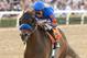 In a photo provided by Benoit Photo, Game On Dude and jockey Mike Smith win the $750,000 Santa Anita Handicap horse race Saturday, March 8, 2014, at Santa Anita in Arcadia, Calif. (AP Photo/Benoit Photo)