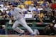 Chicago Cubs' Darwin Barney bats during a baseball game against the Pittsburgh Pirates in Pittsburgh Tuesday, June 10, 2014. (AP Photo/Gene J. Puskar)