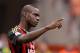 MILAN, ITALY - APRIL 19: Mario Balotelli of AC Milan celebrates scoring the first goal during the Serie A match between AC Milan and AS Livorno Calcio at San Siro Stadium on April 19, 2014 in Milan, Italy. (Photo by Claudio Villa/Getty Images)