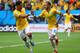 BRASILIA, BRAZIL - JUNE 23: Neymar of Brazil (R) celebrates scoring his team's first goal with Hulk during the 2014 FIFA World Cup Brazil Group A match between Cameroon and Brazil at Estadio Nacional on June 23, 2014 in Brasilia, Brazil. (Photo by Clive Brunskill/Getty Images)