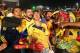 Colombia soccer fans celebrate the second goal scored by their team as they watch a live telecast of their team's World Cup against with Japan inside the FIFA Fan Fest area on Copacabana beach, in Rio de Janeiro, Brazil, Tuesday, June 24, 2014. Substitute James Rodriguez scored a brilliant goal and set up two more for Jackson Martinez as Colombia beat Japan 4-1 on Tuesday to confirm top spot in Group C and eliminate the Asian champions from the World Cup. (AP Photo/Leo Correa)