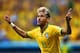 BRASILIA, BRAZIL - JUNE 23: Neymar of Brazil celebrates scoring his team's second goal and his second of the game during the 2014 FIFA World Cup Brazil Group A match between Cameroon and Brazil at Estadio Nacional on June 23, 2014 in Brasilia, Brazil. (Photo by Clive Brunskill/Getty Images)